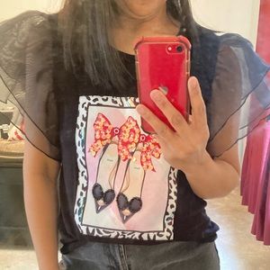 Black shirt with tule sleeves
